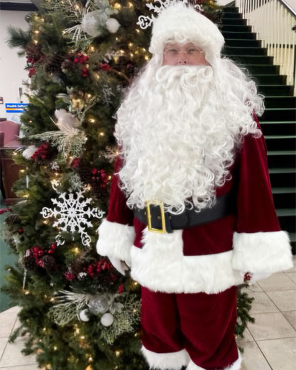 velvet santa suit with tree